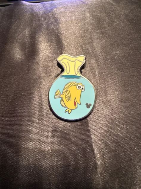 finding nemo bag pins vs fake|hidden mickey pins.